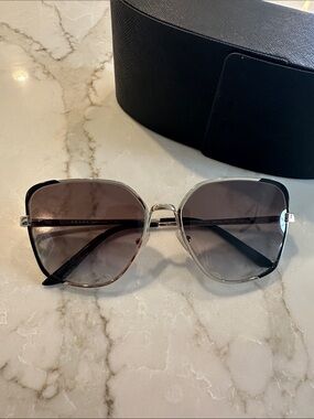 Prada Women's Gold Frame Sunglasses with Black Gradient Lenses